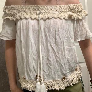 Very cute off the shoulder cream blouse